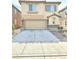 Inviting two-story home with a large two-car garage and well-kept front yard at 7319 Burnt Umber St, Las Vegas, NV 89139