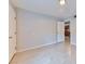 The bedroom features tile flooring, white trim, natural light, and neutral walls at 7885 W Flamingo Rd # 1016, Las Vegas, NV 89147