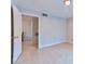 A bright and airy bedroom with tile floors and neutral paint, offering a clean and modern aesthetic at 7885 W Flamingo Rd # 1016, Las Vegas, NV 89147