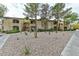 Apartment complex with well-manicured grounds and desert landscaping, offering a serene and appealing living environment at 7885 W Flamingo Rd # 1016, Las Vegas, NV 89147