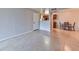 Inviting living area featuring tiled flooring, a view into the kitchen, and a dining space perfect for entertaining at 7885 W Flamingo Rd # 1016, Las Vegas, NV 89147
