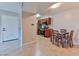 Apartment featuring a modern kitchen, dining area, and door for easy access at 7885 W Flamingo Rd # 1016, Las Vegas, NV 89147