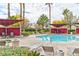 Community pool area, complete with ample lounge chairs and shaded seating, perfect for relaxation and social gatherings at 7885 W Flamingo Rd # 1016, Las Vegas, NV 89147