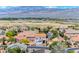 Aerial view of a residential community, showcasing neighborhood layout and mountain views, capturing a sense of place at 7892 Villa Salsa Ave, Las Vegas, NV 89131