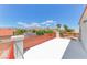 Balcony offering panoramic views of the neighborhood, trees, and distant mountains at 7892 Villa Salsa Ave, Las Vegas, NV 89131