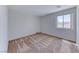 Clean and empty bedroom with patterned carpet and natural light at 7892 Villa Salsa Ave, Las Vegas, NV 89131