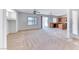 Bright living space featuring neutral carpet, and is brightened with natural light at 7892 Villa Salsa Ave, Las Vegas, NV 89131