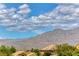 Mountain view with tile roofed neighborhood homes at 7892 Villa Salsa Ave, Las Vegas, NV 89131
