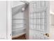 Walk-in pantry features shelving and a door organizer for maximum storage and convenience at 7892 Villa Salsa Ave, Las Vegas, NV 89131
