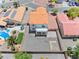 Aerial view of backyard with stucco walls, rock ground cover, and covered patio of a two-story home at 7892 Villa Salsa Ave, Las Vegas, NV 89131