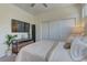 Bedroom featuring built in closet, neutral decor and a ceiling fan at 8335 Beaten Path Ct, Las Vegas, NV 89166