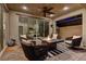 Inviting outdoor living space with a modern fire pit, stylish seating, and seamless indoor-outdoor flow at 8335 Beaten Path Ct, Las Vegas, NV 89166