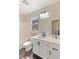 Bright bathroom featuring a large mirror, modern vanity, and neutral color palette at 8507 Titania Ct, Las Vegas, NV 89147