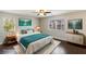 Stylish bedroom featuring modern decor, a comfortable bed, and ample natural light at 8507 Titania Ct, Las Vegas, NV 89147