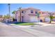 Charming two-story home featuring desert landscaping, a two-car garage, and a tile roof at 8507 Titania Ct, Las Vegas, NV 89147