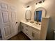 Bathroom showcasing double sinks, updated fixtures and cabinetry at 8720 Prairie Hill Dr, Las Vegas, NV 89134