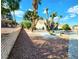 Front yard view featuring a unique Joshua tree and desert landscaping at 8720 Prairie Hill Dr, Las Vegas, NV 89134