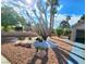 Front yard featuring desert landscaping, rocks and mature Joshua tree at 8720 Prairie Hill Dr, Las Vegas, NV 89134