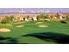 Scenic view of the lush green golf course with the Las Vegas skyline in the distance at 8720 Prairie Hill Dr, Las Vegas, NV 89134