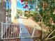 Yard with path, colorful flowering bushes and views of the house at 8720 Prairie Hill Dr, Las Vegas, NV 89134