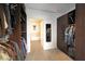 Spacious walk-in closet with multiple compartments, clothing racks and access to bathroom at 900 Las Vegas Blvd # 715, Las Vegas, NV 89101