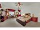 Spacious bedroom features ceiling fan, window, comfortable bed, and side tables at 9142 Royal Monarch Ct, Las Vegas, NV 89147