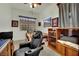 Comfortable bedroom featuring a window, ceiling fan, and closet space at 9142 Royal Monarch Ct, Las Vegas, NV 89147