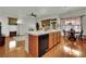Open floor plan with hardwood floors, and an eat-in kitchen at 9142 Royal Monarch Ct, Las Vegas, NV 89147