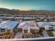 An aerial view showing desert homes close to the mountain range at 10048 Copper Edge Rd, Las Vegas, NV 89148