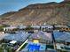 Aerial view showing the community homes and mountain views at 10048 Copper Edge Rd, Las Vegas, NV 89148