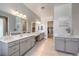 Spacious bathroom with dual vanities, walk-in closet, and plenty of counter space at 10048 Copper Edge Rd, Las Vegas, NV 89148