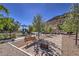 Community playground features play structures, benches, and natural desert landscaping at 10048 Copper Edge Rd, Las Vegas, NV 89148