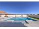 Inviting pool and spa featuring a modern design and sleek concrete surround, perfect for relaxation at 10048 Copper Edge Rd, Las Vegas, NV 89148