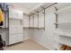 Walk-in closet with built-in shelving, drawers, and ample storage space for clothing and accessories at 10316 Apefly St, Las Vegas, NV 89141