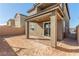New home's backyard features a blank canvas, awaiting your personal landscaping touches and design at 10328 Apefly St, Las Vegas, NV 89141