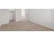 Bedroom featuring neutral carpet, fresh paint, and white trim at 10328 Apefly St, Las Vegas, NV 89141