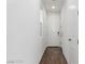Entryway with light walls and doors and dark wood-look flooring at 10328 Apefly St, Las Vegas, NV 89141