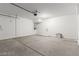 Spacious two-car garage with ample room for parking and storage, offering convenience at 10328 Apefly St, Las Vegas, NV 89141