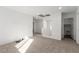 Bright upstairs hallway with access to the laundry room at 10328 Apefly St, Las Vegas, NV 89141