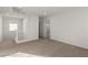 Upstairs hallway boasts neutral carpet and crisp white walls at 10328 Apefly St, Las Vegas, NV 89141