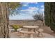 Outdoor seating area with stone table and seating, with views of the city at 10550 W Alexander Rd # 2082, Las Vegas, NV 89129