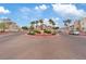A well-manicured roundabout and entrance creates a welcoming atmosphere to the property at 10550 W Alexander Rd # 2082, Las Vegas, NV 89129