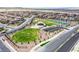Aerial shot of the community park that offers a playground and multiple sports courts in a neighborhood at 10590 Dryades Ave, Las Vegas, NV 89166