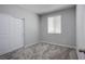Clean bedroom features neutral walls, plush carpet and large closet for ample storage at 10590 Dryades Ave, Las Vegas, NV 89166