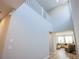 Spacious entryway with high ceilings flows into the adjacent living area at 10590 Dryades Ave, Las Vegas, NV 89166