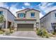 Charming two-story home featuring desert landscaping, a tile roof and a two car garage at 10590 Dryades Ave, Las Vegas, NV 89166