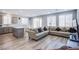 Open concept living room connects to the kitchen with lots of natural light at 10590 Dryades Ave, Las Vegas, NV 89166