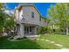 Charming backyard featuring a well-maintained lawn, stepping stones, and a cozy patio area for outdoor relaxation at 10761 Capesthorne Way, Las Vegas, NV 89135