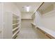 Walk-in closet with shelving, and carpet at 10761 Capesthorne Way, Las Vegas, NV 89135