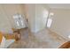 Open foyer with tile flooring, high ceilings, and natural light at 10761 Capesthorne Way, Las Vegas, NV 89135